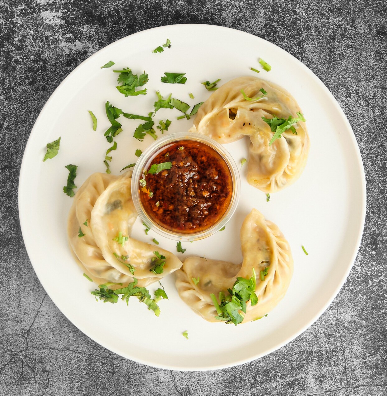 Momos — steamed, fried or chilly fried